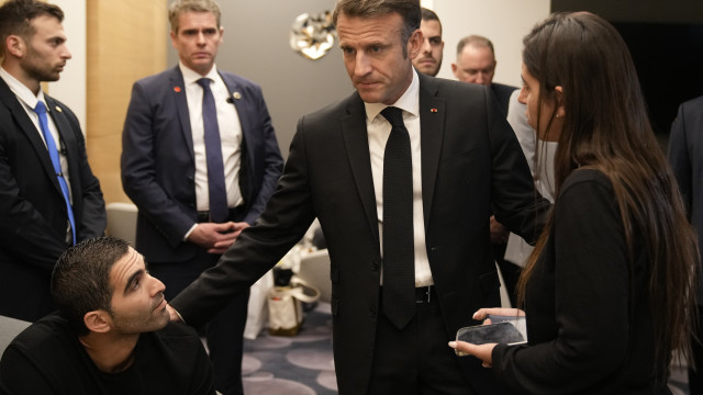 French President Emmanuel Macron meets with Israeli-French nationals who have lost loved ones, as well as families of hostages at the Ben Gurion airport near Tel Aviv Israel 24 October 2023